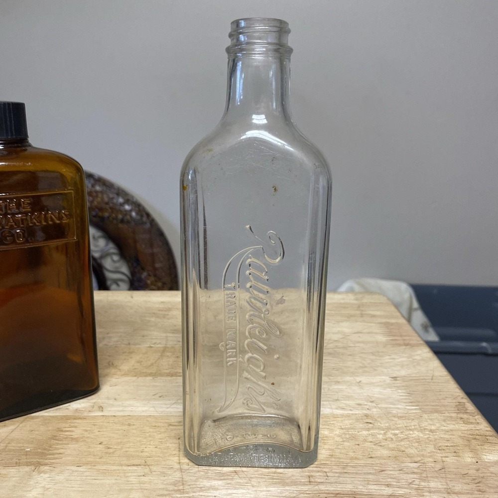 Rawleighs Clear Glass Medicine Bottle Embossed Logo Twist Off Cap